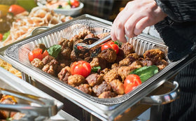 Waytiffer buffet-catering pans in use at a serving station.