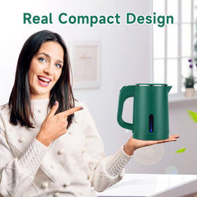 Wdcme compact travel kettle beside luggage, perfect for hotel stays.