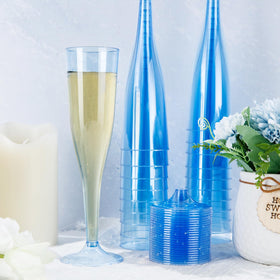 WDF blue champagne flutes in a party setting for easy disposal.