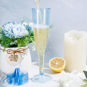 WDF wedding table scene featuring blue champagne flutes for ambiance.