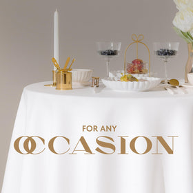Wealuxe wedding banquet setup with white round tablecloths