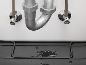 WeatherTech SinkMat lifetime-warranty provides long-term cabinet protection.