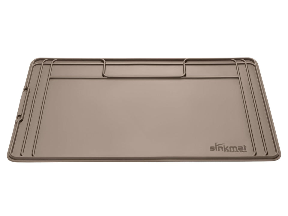 WeatherTech SinkMat with raised lip protects cabinets from under-sink leaks.