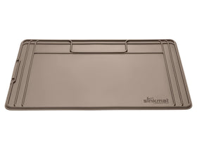 WeatherTech SinkMat under-sink protector with raised lip traps leaks.