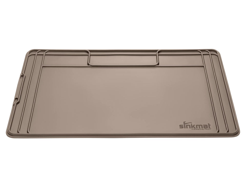 WeatherTech SinkMat under-sink protector with raised lip traps leaks.