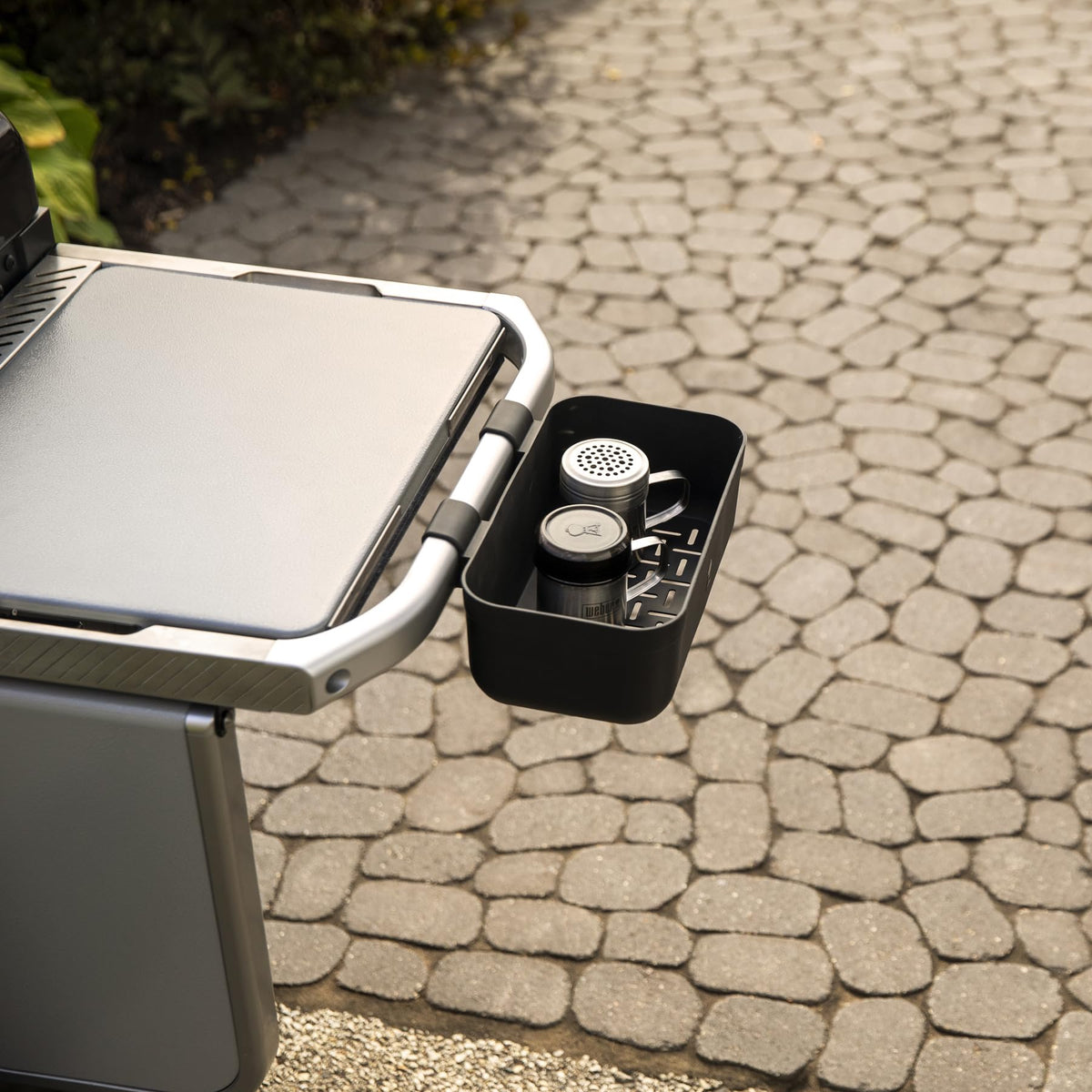Drainage holes on the Condiment Caddy prevent pooling on the rail