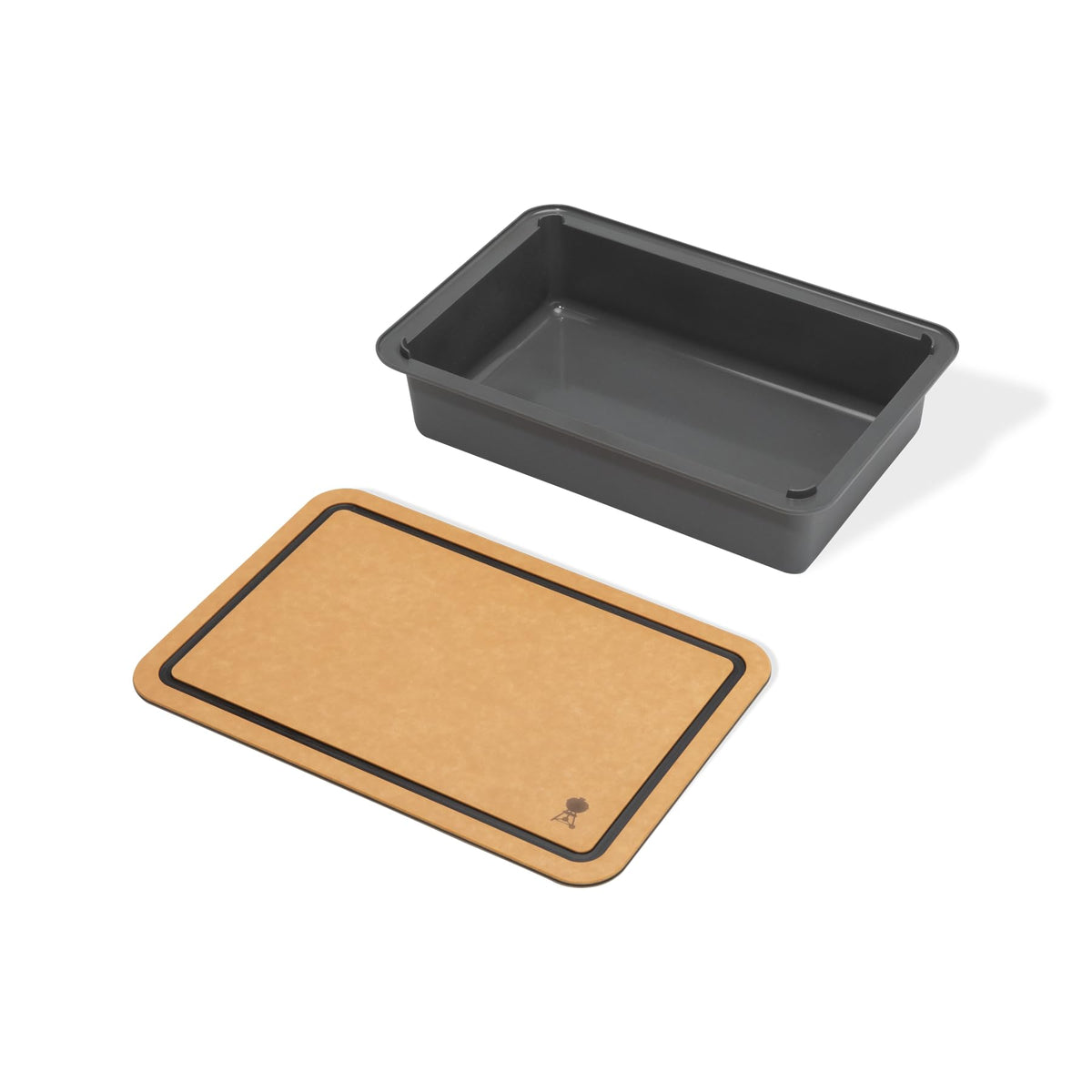 Weber Works container and cutting board in use for streamlined transport.