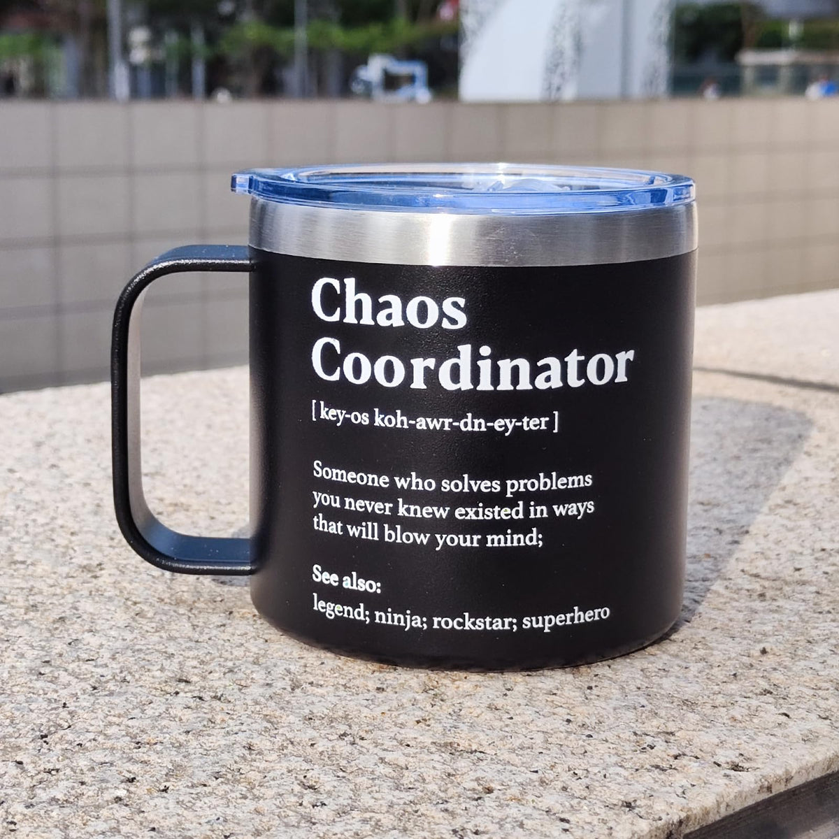 Daily coffee ritual with WECACYD Chaos Coordinator mug's stylish black design.