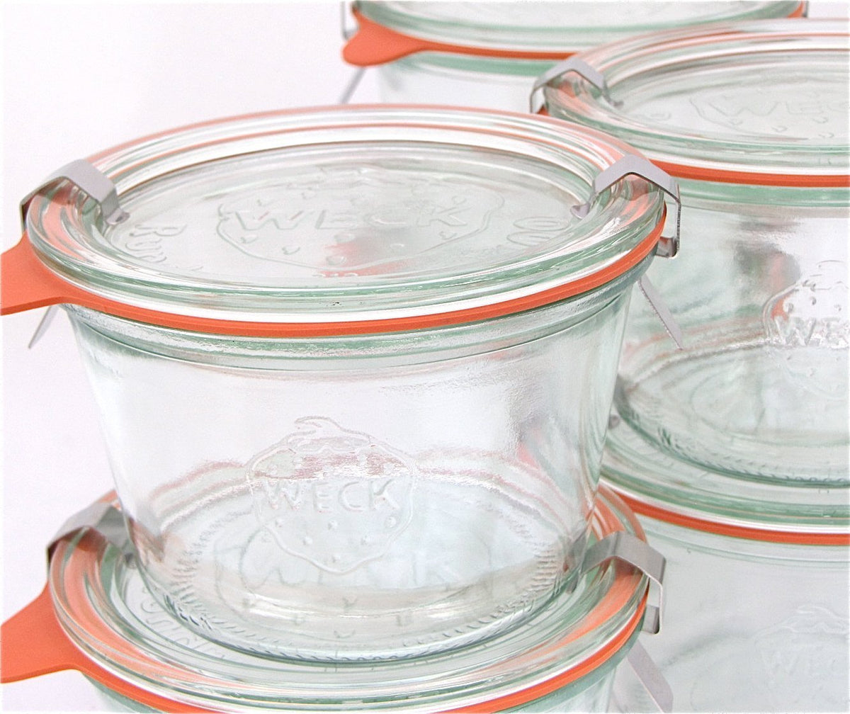 Weck 741 stackable glass jar with lids saving space and organizing contents.