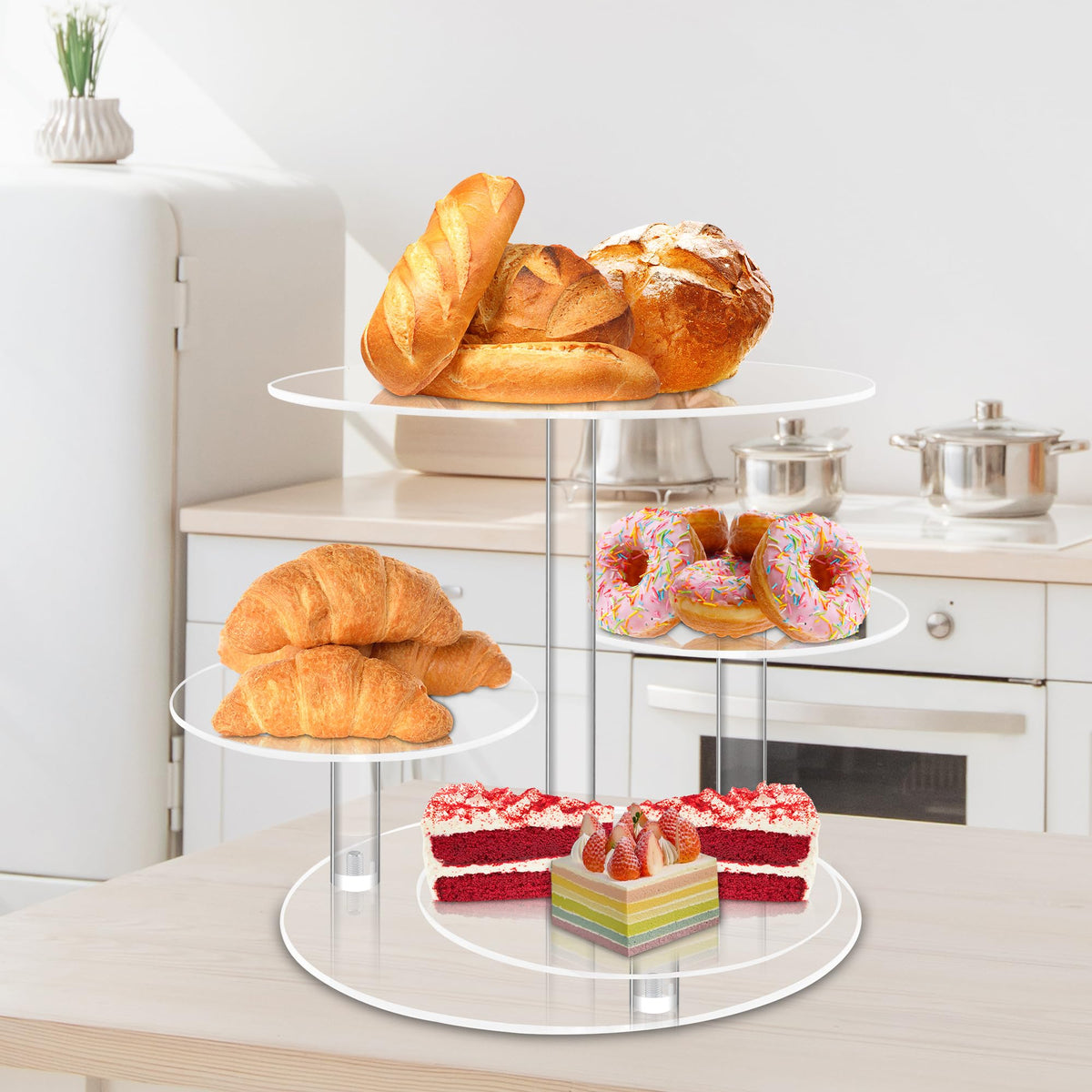 Weddingwish tiered dessert display holds up to 50 cupcakes.