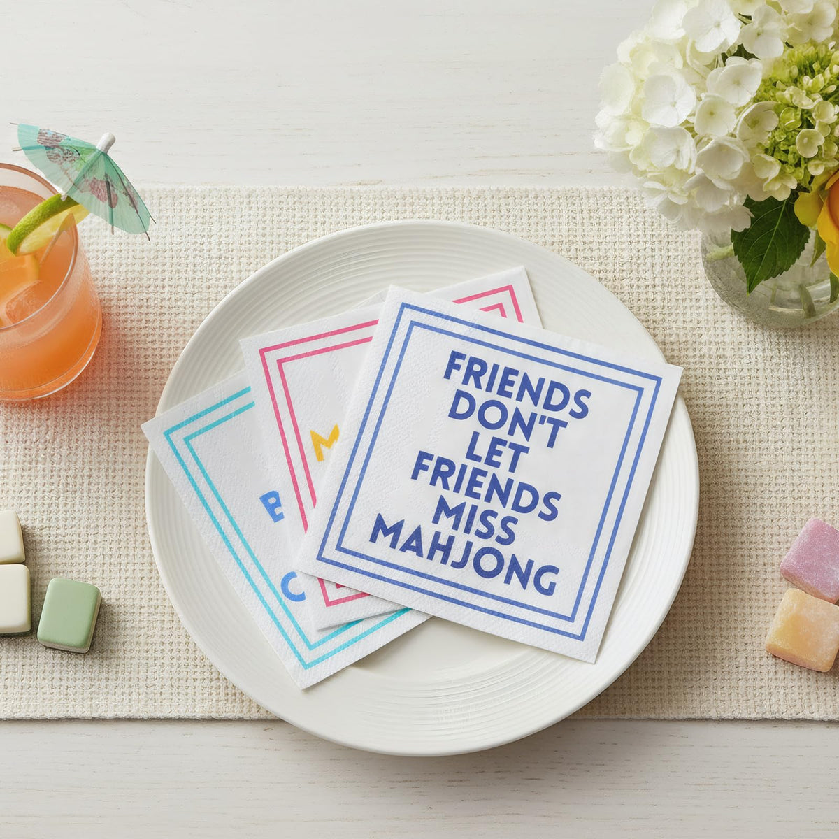 Weekgrat Mahjong Napkins folded 5x5 compact under cups for neat tables