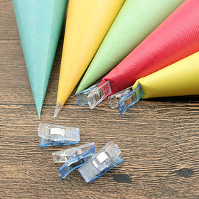 Includes two clips and one scriber needle for pattern drawing and neat tips.