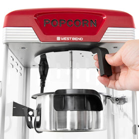 West Bend Stir Crazy Popcorn Maker 4 quart capacity for family movie nights.
