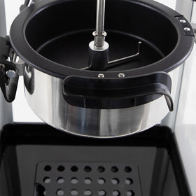 West Bend Stir Crazy Popcorn Maker includes scoop and measuring tools for prep.