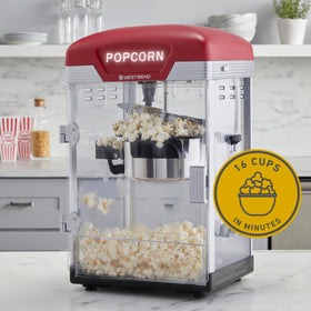 West Bend Stir Crazy Popcorn Maker magnetic kettle for easy filling and pouring.