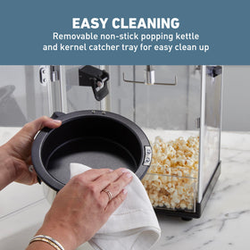 West Bend Stir Crazy Popcorn Maker removable kernel catcher tray for easy cleanup.