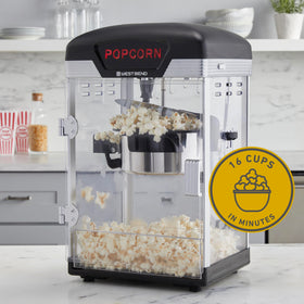 West Bend Stir Crazy popcorn popper front view in a family kitchen setup