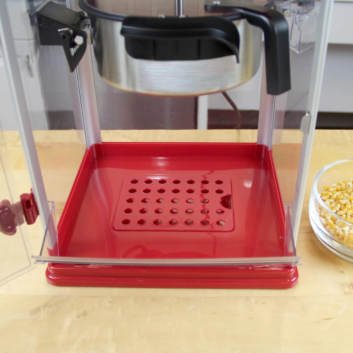 Included measuring tool and popcorn scoop with West Bend popper