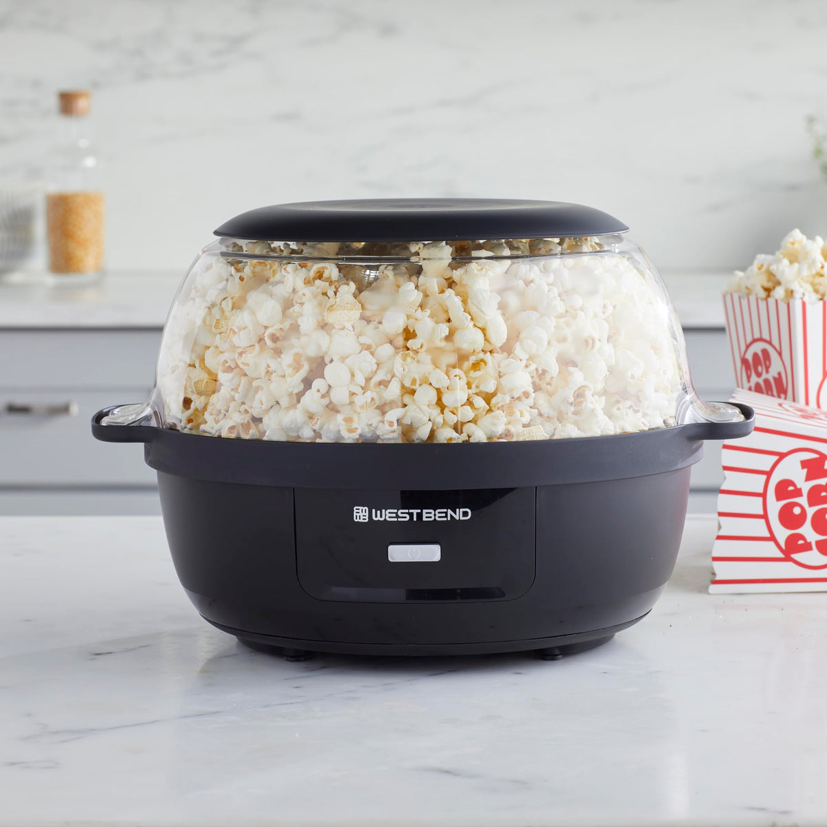 West Bend Stir Crazy popper with motorized stir rod ensures even popping.