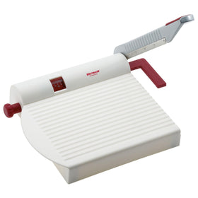 Westmark adjustable cheese slicer with board showing precise portions.