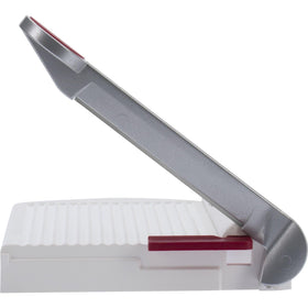 Westmark ergonomic handle shown for secure grip during steady downward cuts.