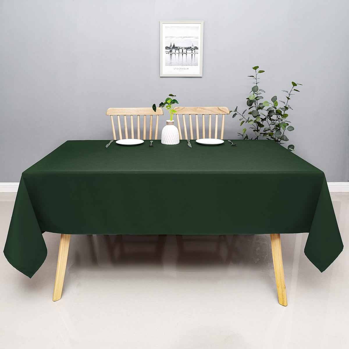 Wewoch Hunter Green kitchen tablecloth protects surfaces during everyday meals.