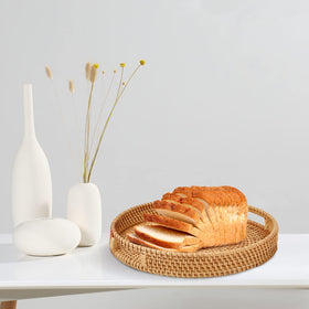 Whalehub rattan tray serving coffee and fruit on a stylish kitchen counter.