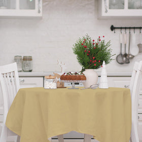 Whaline round table cloth measures 84 inches to fit standard dining surfaces.