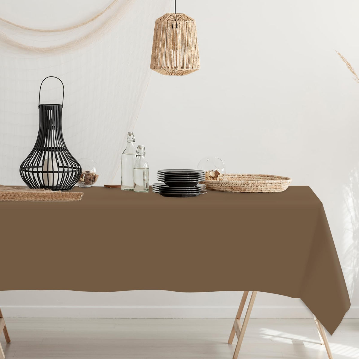 Whaline woodland tablecloth closeup shows durable plastic surface for easy cleanup.