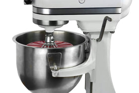 Whisk Wiper Pro counter-mess keeps prep area tidy during mixing.