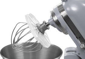 Whisk Wiper PRO cleans whisk and bowl for a mess-free counter.
