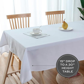 Wedding event table with WEALUXE tablecloth highlighting clean, elegant lines.