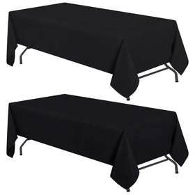 White Classic WEALUXE black tablecloth on an 8ft table with a 15-inch drop.