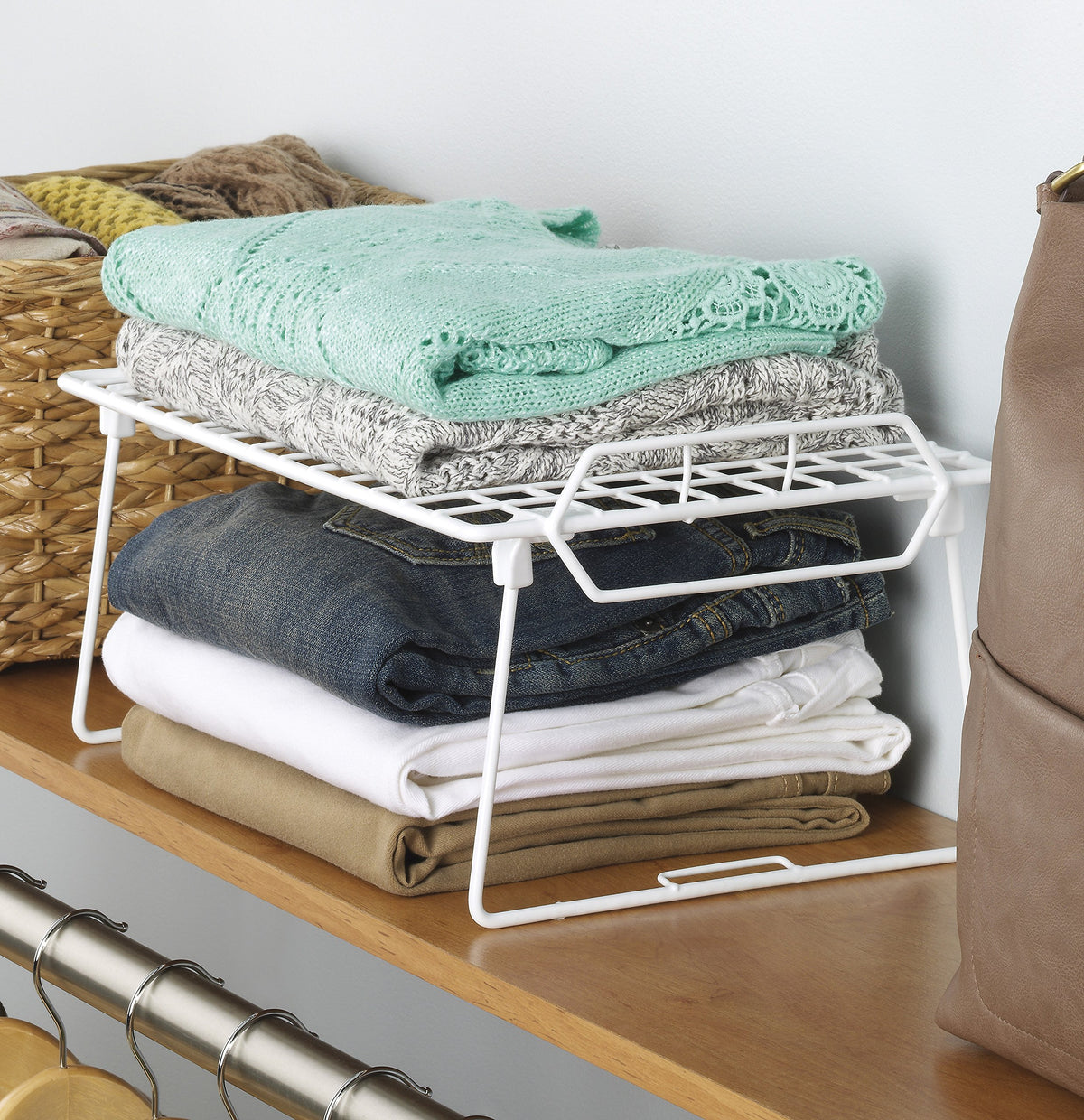 Whitmor Wire Grid Stacking Utility Shelf under sink setup for organized cleaning supplies.