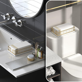 Wican towel holder on bathroom back of toilet keeping towels accessible.