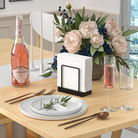 Wican bamboo-iron stand supports napkins with sturdy construction.