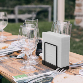 Wican standing dispenser shown on dining countertop for versatile use.