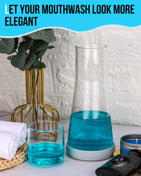 Mouthwash carafe on bathroom counter adds elegance and easy access.