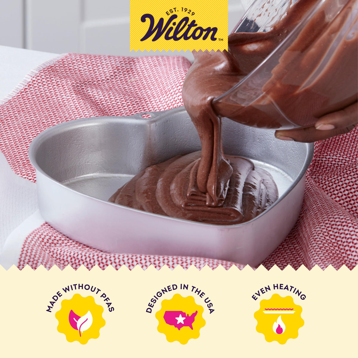 Wilton aluminum heart pan 8in highlights sturdy rim for easy handling.