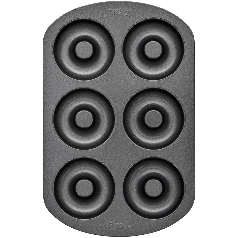Wilton 6-cavity doughnut pan with even heat distribution for consistent results.