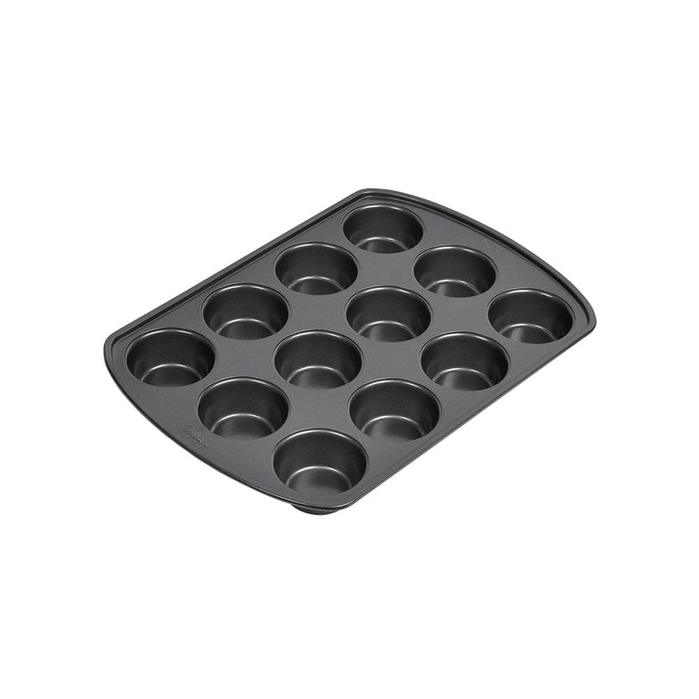 Non-stick coating enables easy release on Wilton pan for cupcakes