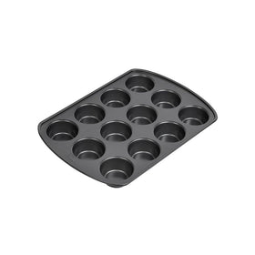 Non-stick coating enables easy release on Wilton pan for cupcakes