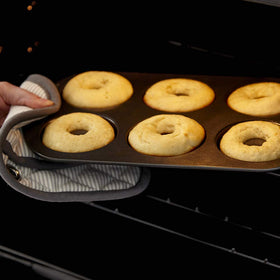 Wilton Pan delivers even-heat distribution for perfectly browned donuts.