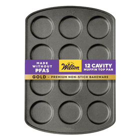 Wilton Gold non-stick muffin top pan with 12 cavities for even baking.