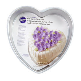 Wilton 8-inch heart-shaped cake pan viewed from top for even heat distribution.
