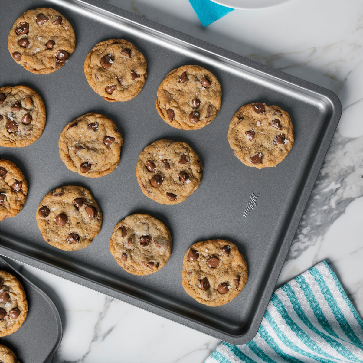 Wilton Silver 2-Piece Baking Sheet Set shows even heat for uniform browning.