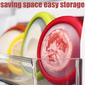 Winb apple-shaped fruit saver fits halved produce for quick access.