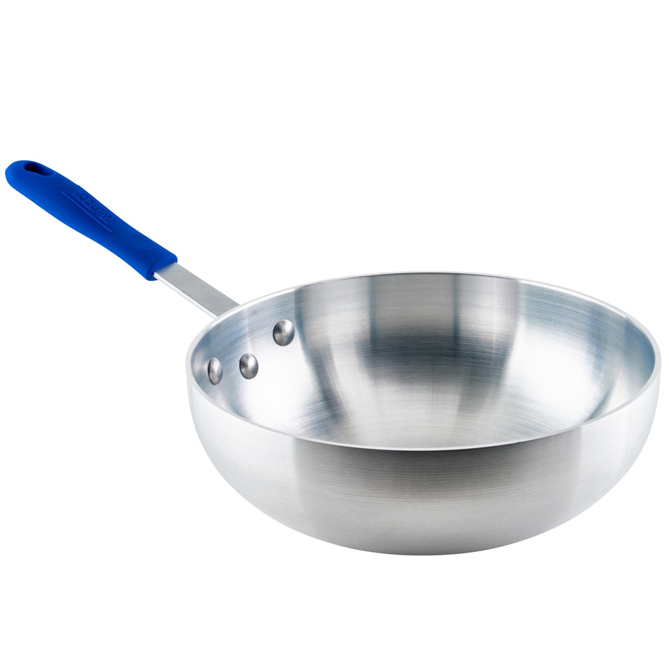 Winco 11-inch aluminum stir fry pan, top view for even high-heat sautéing.