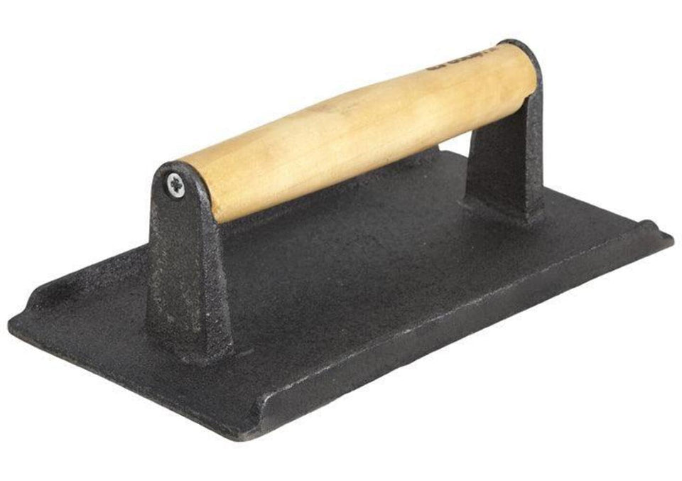 Winco SWA-2 cast iron steak weight, top view, promotes even searing for consistent results.