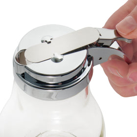 Winco syrup dispenser clear glass body for quick syrup level checks.
